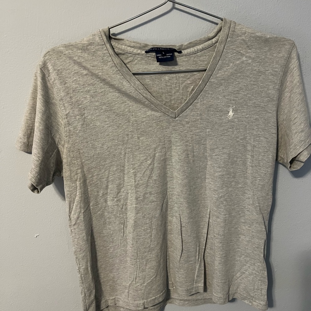 Woman’s gray polo v-neck tshirt